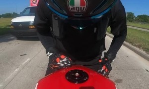 Motorcyclist Gets Tangled in Truck's Safety Tape