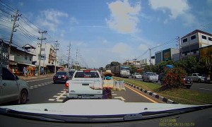 Out-of-Control Truck Hops Median and Almost Hits Pedestrian