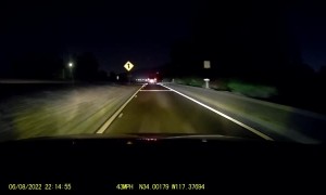 Car Parked on Freeway Causes Crash