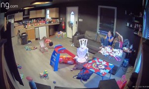 Child Inexplicably Leaps From Toy Slide