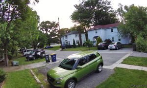 Woman Loses Control of Car and It Backs Into Neighbor's Vehicle