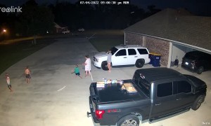 Firework Falls Over Nearly Hitting Family in Driveway