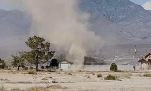Huge Dust Devil Dissipates Over House