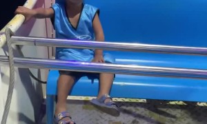 Child Just Chills on Amusement Park Ride