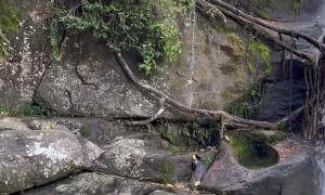 Cliff Jumping Man Loses Traction and Slips off Edge Landing on Rocks Below