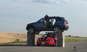 Stunt Man Flies Through Car