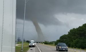 Huge Dust Devil Forms in Refinery