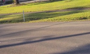 Smoke Spewing Car Nearly Causes Crash