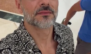 Dog Slides on Floor While Owner Goes Shopping