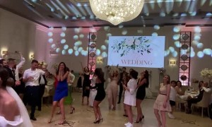 Bride's Bouquet Gets Stuck in Chandelier