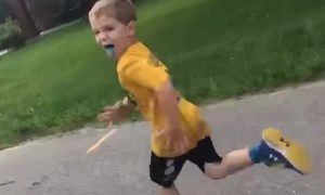 Kid Runs Right Into Parked Car