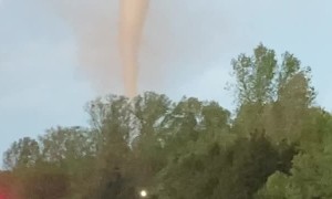Police Officer Observing a Tornado Going Through Andover, Kansas