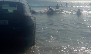 Car Gets Stuck on the Beach