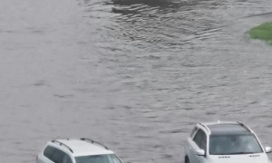 Double Trouble as Cars Get Stuck in a Flood