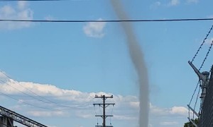 Dust Devil Reaches High Into Sky
