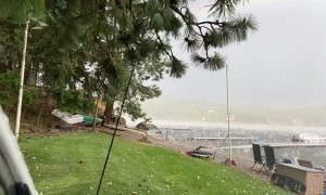Double Rainbow in Hailstorm Over Lake