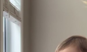 Toddler Eats Cheese from Her Toes