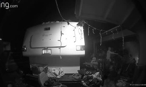 Son Stops Garage Fire With a Hose