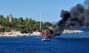 Yacht Burns on the Water