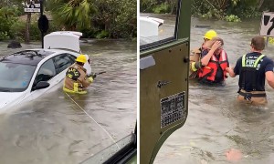 Firefighter breaks into car during rescue as Hurricane Ian hits Florida