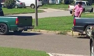 Guys Tow a Truck Using Another Truck and Jack