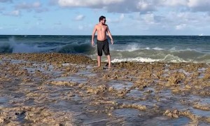 Big Wave Plows Over Man on Beach