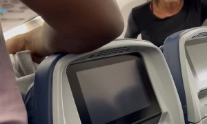 Upset Passenger Throws Water Bottle on Plane