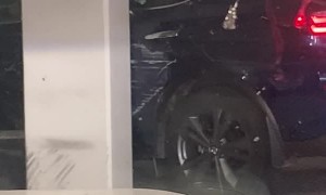 Woman Damages Car Trying to Squeeze Into Parking Space