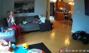 Dad Reflexes Kick in When Baby Tumbles off Couch
