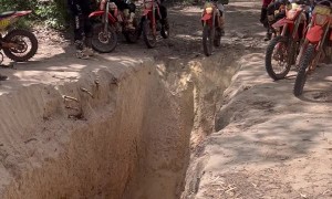 Dirtbiker Falls Into Mud