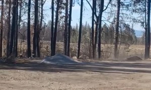 Large Dust Devil Swirls Around House at Job Site