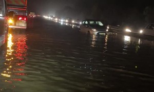 Cars Stuck in Flood Waters on Road A27