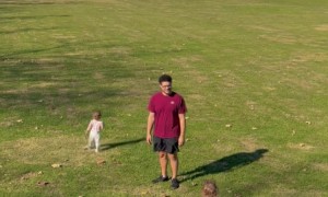 Twins Walking Down a Hill Fall Simultaneously