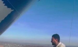 Man Shows How He Paints a Tall Tower for Work