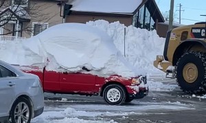 Snow-Covered Pickup Goes for a Drive