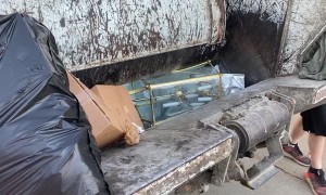 Garbage Truck Demonstrates Crushing Power