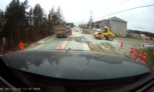 Drivers Ignore Traffic Cones at Construction Site