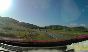 Tractor Has Near Miss With Car