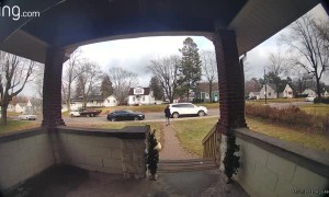 Woman Falls on Slippery Front Steps