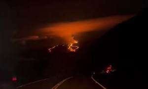Footage of lava flow from Mauna Loa recorded from highway 