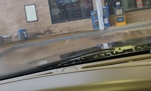 Girl Reacting to Shifter in Truck Breaking at Gas Station