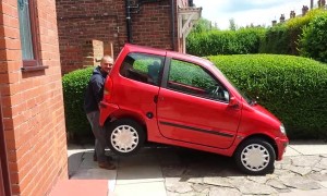 Picking Up a Car Like It Weighs Nothing