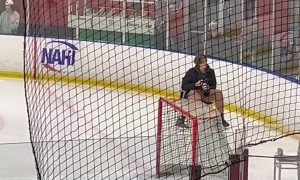 Student Deftly Dodges Hockey Puck
