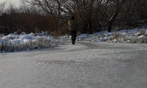 Cat Takes off With Ice Fisherman's Catch