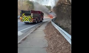 Car Driving on Rim Catches Fire