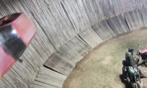 Driver Completes 'Well of Death' in Car Stunt