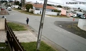 Man Dodges White Van Knocked Off Course by Collision