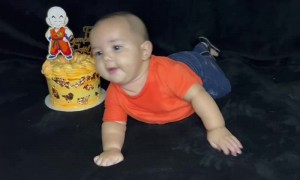 Baby Rolls Headfirst into Birthday Cake