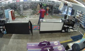 Van Drives Through Gaming Store