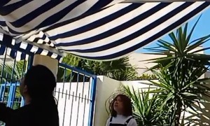 Mom Accidently Splashes Daughter While Cleaning Awning